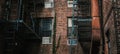 Horizontal shot of fire escape stairs on a brick building Royalty Free Stock Photo