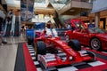 Horizontal shot front side of a vintage Ferrari F1 Championship car inside of Maremagnum mall Royalty Free Stock Photo