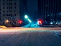 Horizontal shot of an illuminated crossroad in downtown Montreal, Canada during the night Royalty Free Stock Photo