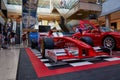 Horizontal shot low angle of a vintage Ferrari F1 Championship car inside of Maremagnum mall Royalty Free Stock Photo