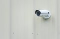 Outdoor Security camera On Plain Wall with Copy Space Royalty Free Stock Photo