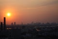 Horizontal shot of the red cloudy sunset sky at Sukkhumvit downtown, Bangkok Thailand. Royalty Free Stock Photo