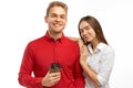 Horizontal shot of satisfied businesswoman  laughs happily, leans at shoulder of boyfriend, come together on lunch Royalty Free Stock Photo