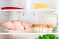 Horizontal shot shelves of the refrigerator with food