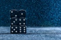 Six black different dice on a blue background. The concept of gambling. Cubes from one to six. Royalty Free Stock Photo