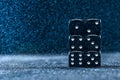 Six black different dice on a blue background. The concept of gambling. Cubes from one to six. Royalty Free Stock Photo