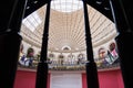 Horizontal shot between stair railings within the pit of leeds corn exchange