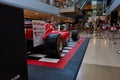 Horizontal shot of a vintage Ferrari F1 Championship car inside of Maremagnum Shopping mall Royalty Free Stock Photo