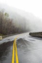 Curving Smoky Mountain Road Disappears Into Fog With Copy Space Royalty Free Stock Photo