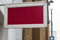 Square empty signboard on a building with classical architecture Royalty Free Stock Photo