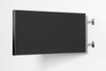 Horizontal singboard or signage isolated on the white wall with blank black sign mock up. Side view. Royalty Free Stock Photo