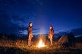 Night camping for two in the mountains under starry sky Royalty Free Stock Photo