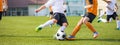 Horizontal Soccer Background. Young Football Players Kicking Ball on Soccer Field Royalty Free Stock Photo