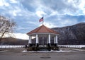 Horizontal sunset view of Cold Spring Pier Gazebo overlooking the frozen Hudson River. Royalty Free Stock Photo