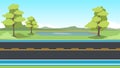 Horizontal view of Asphalt road. with bike lense. Background of trees and green grass with puddle and mountain. Royalty Free Stock Photo