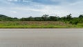 Horizontal view of an asphalt road in Thailand. Royalty Free Stock Photo