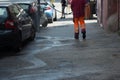 Horizontal View of a Dustman Cleaning the Street With a Water Pr Royalty Free Stock Photo