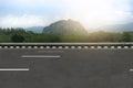 Horizontal view of empty blurred of asphalt road with roadside. Royalty Free Stock Photo