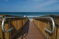 Horizontal view of a empty wooden pathway to the beach