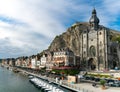 Horizontal view of the Meuse River and the historic old riverside town of Dinant in Belgium