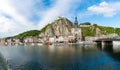 Horizontal view of the Meuse River and the historic old riverside town of Dinant in Belgium