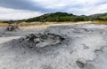 Horizontal view with muddy volcano closeup. Natural park with mu