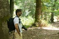 Horizontal View of a Photographer Naturalist Smiling in the Mountains on Blur Background Royalty Free Stock Photo