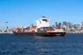 Horizontal view of the Synergy Oakland, a container shio, sailing through Elliott Bay from the