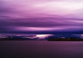 Horizontal vivid vibrant pink purple Norway landscape cloudscape abstraction backdrop background