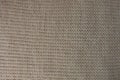 Horizontal wales on beige knitted fabric