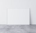 Horizontal white frame, size A3 A4 on White Wall and gray floor. Royalty Free Stock Photo