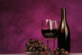 Horizontal of Wine bottle with glasses and grapes Royalty Free Stock Photo