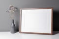 Horizontal wooden frame mockup for artwork, photo, print and painting presentation with dry flowers Royalty Free Stock Photo