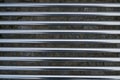 Horizontally placed stainless steel tubes hi-tech facade, iron texture Royalty Free Stock Photo