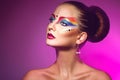 Horizotnal portrait of attractive woman with multicolor make up