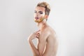 Horizotnal portrait of beautiful gay model with multicolor beard