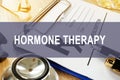 Hormone therapy concept. Prescription form and stethoscope.