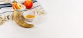 Horn, honey and apples on a white background. Concept of Jewish New Year. Royalty Free Stock Photo