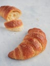 Horn shape whole croissant close up view Royalty Free Stock Photo