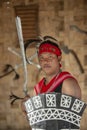 Hornbill Festival.Nagaland,India:1st December 2013 : Naga Garo Tribal Man displya his sword and shield at Hornbill Festival.