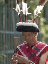 Hornbill Festival.Nagaland,India:1st December 2013 : Naga Tribal Man checking heas weapon at Hornbill Festival Royalty Free Stock Photo