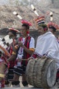 Hornbill Festival.Nagaland,India:1st December 2013 : Naga Tribals Beating drums at Hornbill Festival Royalty Free Stock Photo