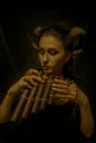 Faun with panflute Royalty Free Stock Photo