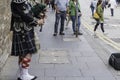 An hornpipe player, in its traditional Scottish Kilt, performing live in Royal Mile street, Edinburgh downtown