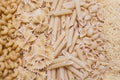 horns, feathers, bows pasta or macaroni and vermicelli background, texture Royalty Free Stock Photo