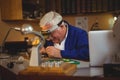 Horologist repairing a watch Royalty Free Stock Photo