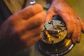 Horologist repairing a watch