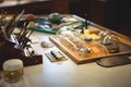 Horologist work tools and equipment on desk