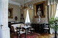 Horovice castle interior, Baroque chateau, carved black wooden furniture, Empire style bedroom, table and chairs, Czech Republic