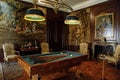 Horovice castle interior, Baroque chateau, carved wooden furniture, smoking room with a collection of pipes, billiards, wood